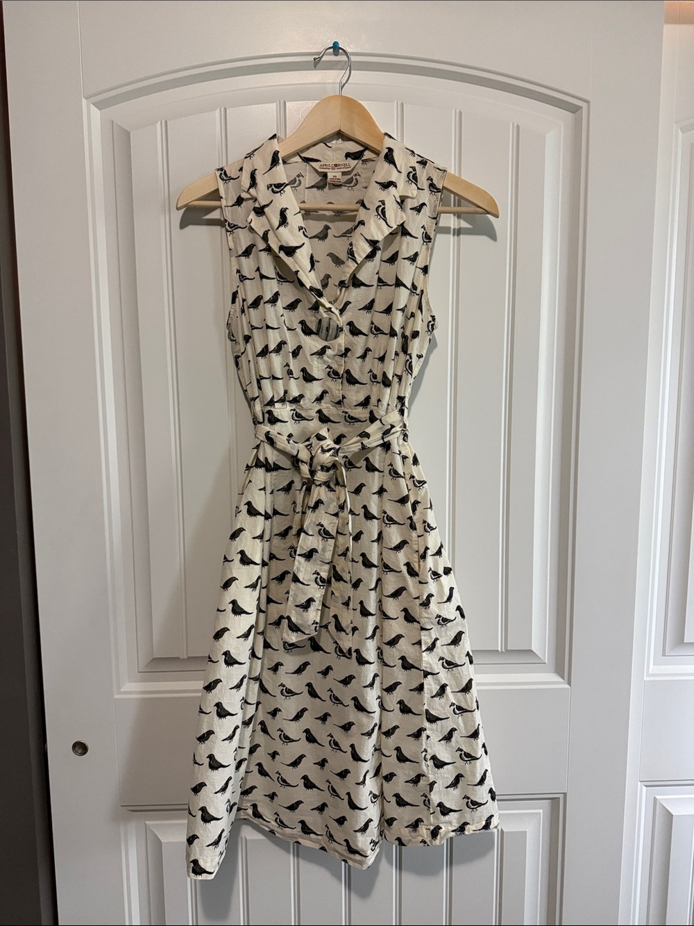 Sleeveless Cream Bird-Print dress